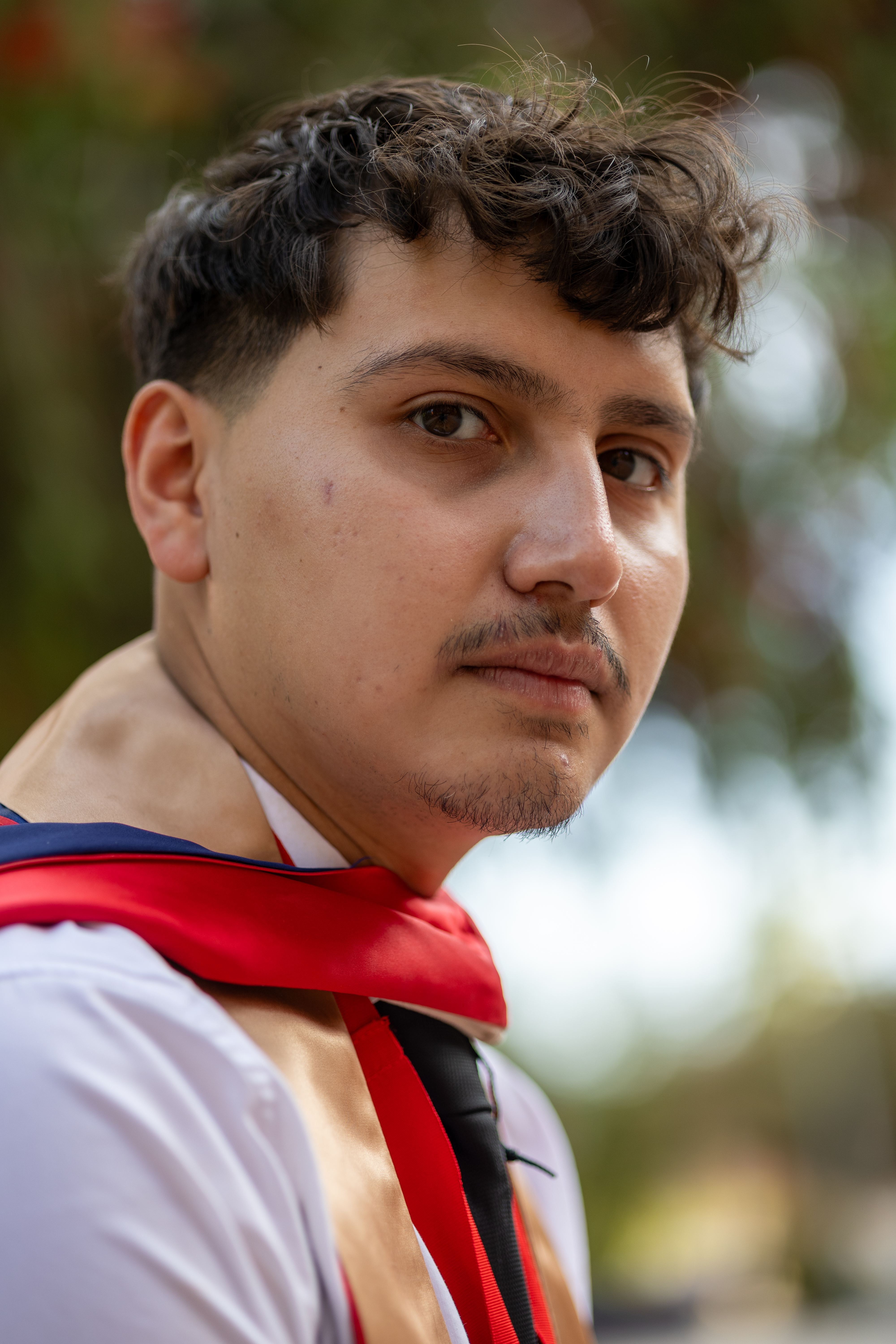 Close graduation portrait photographed by Oros Photography